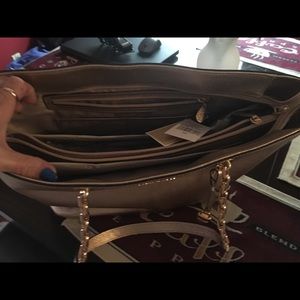 Gold Michael Kor purse NWT